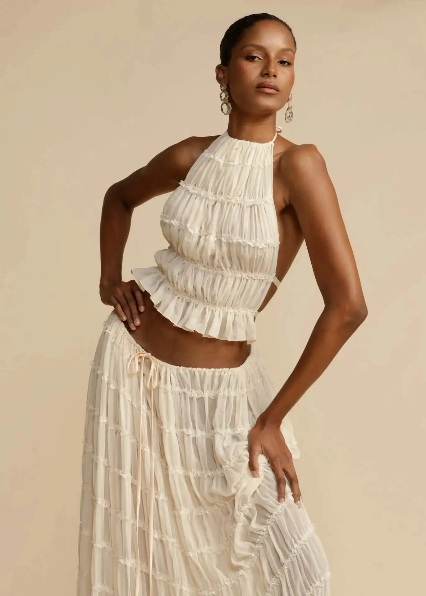Elegant 2 Piece Set White Halter Pleated Maxi Dress with Tiered Layers and Adjustable Waist Belt & Backless Sling Top Long Skirt Suit