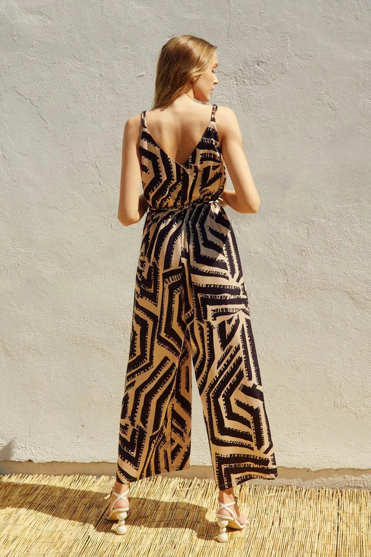 OFF LIMITS CORD STRAP SURPLICE JUMPSUIT